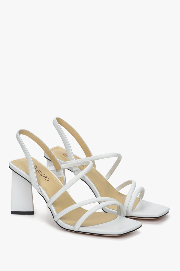 White women's strappy sandals on a block heel by Estro.