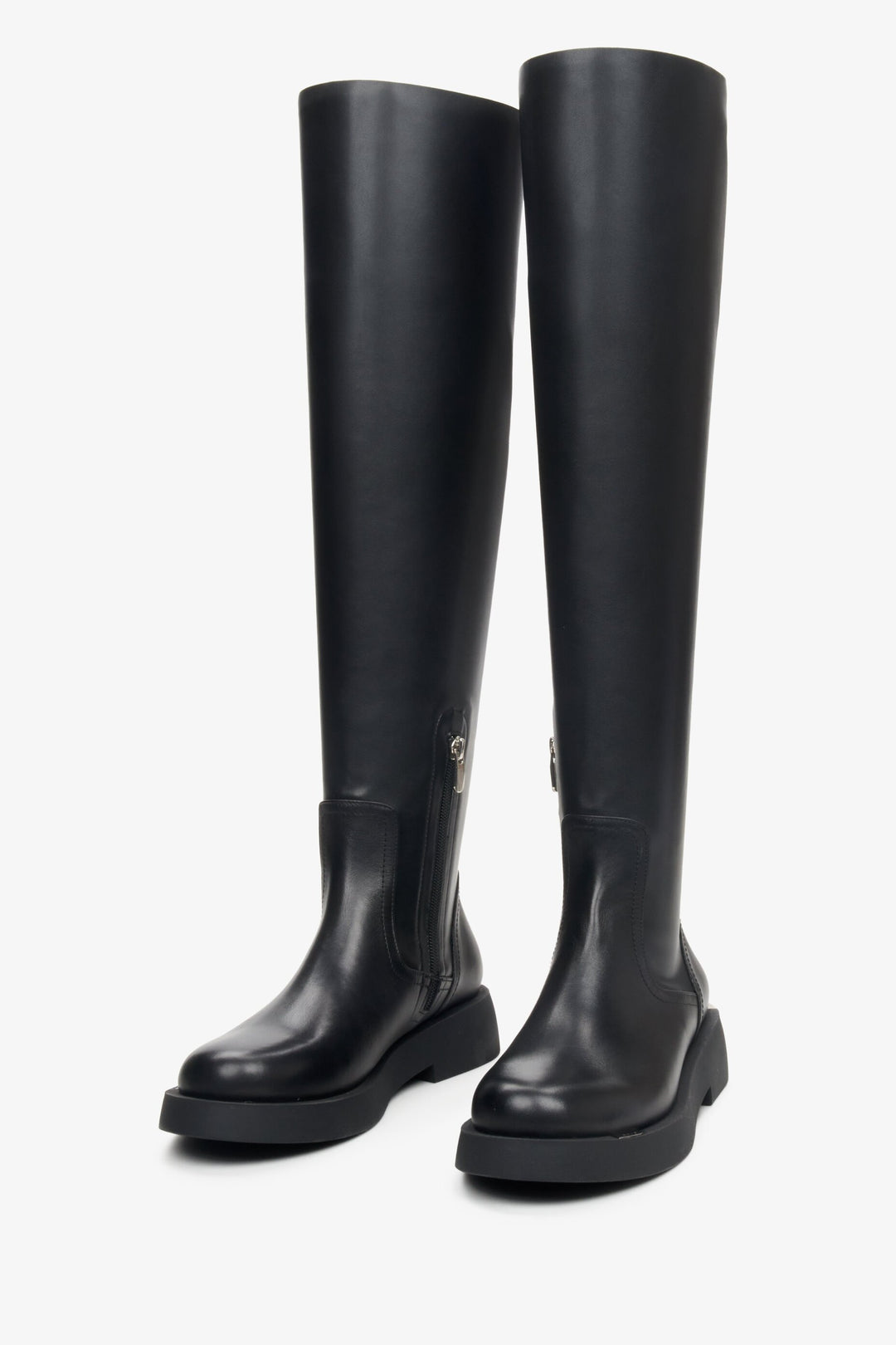 Soft genuine leather black knee-high boots in black.