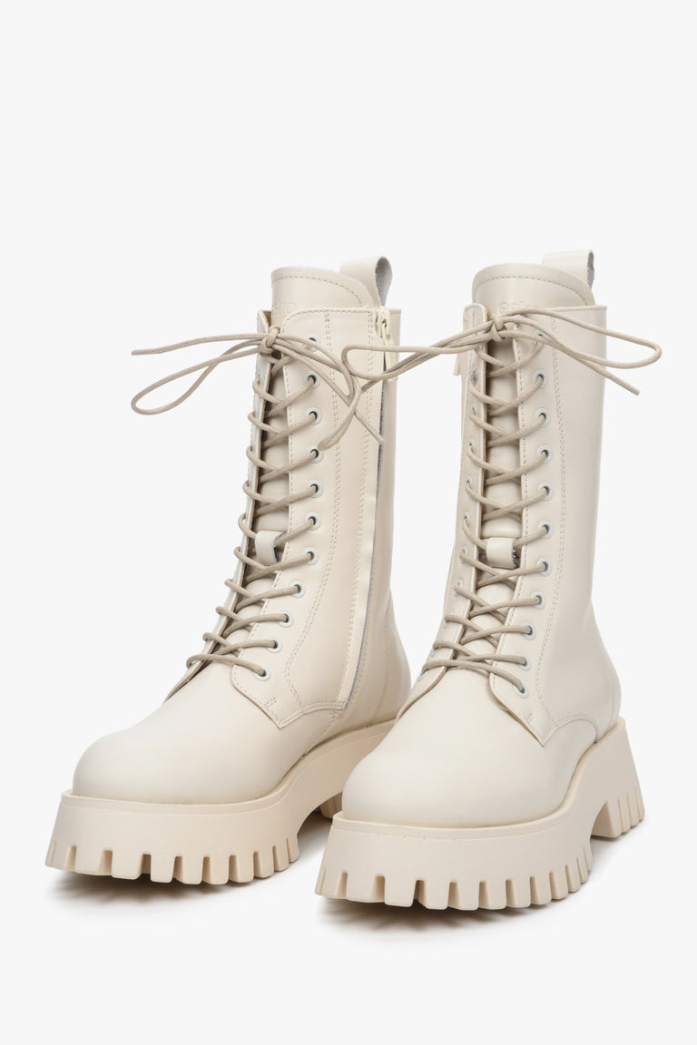 White, high lace-up women's boots made of genuine leather by Estro.