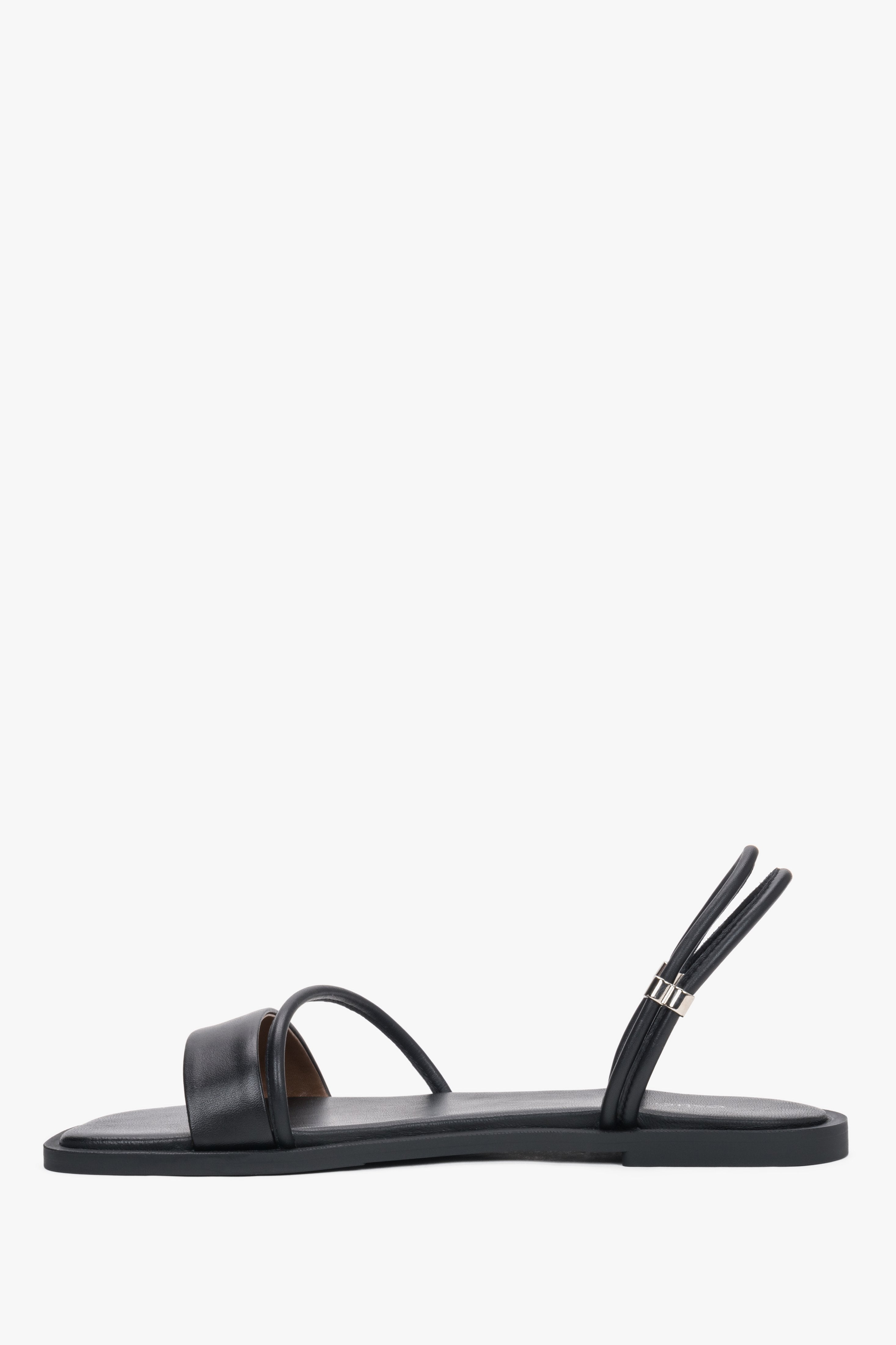 Women’s lightweight black sandals with thin straps made of genuine leather by Estro – side view.