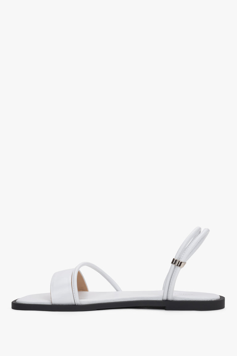 Women’s lightweight white sandals with thin straps made of genuine leather by Estro – side view.