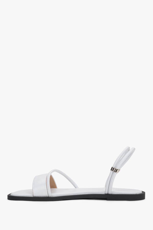 Women’s lightweight white sandals with thin straps made of genuine leather by Estro – side view.