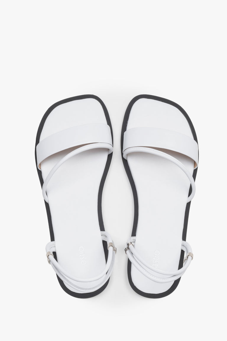 Women’s lightweight white sandals with thin straps made of genuine leather by Estro – top view.