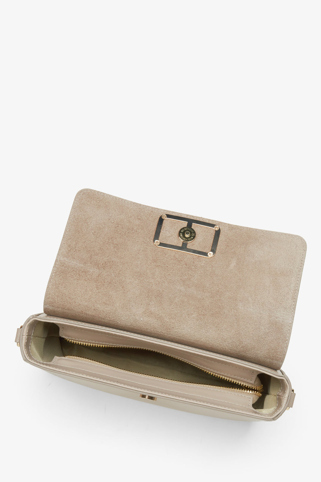 Small women's handbag in beige, designed in the baguette style.