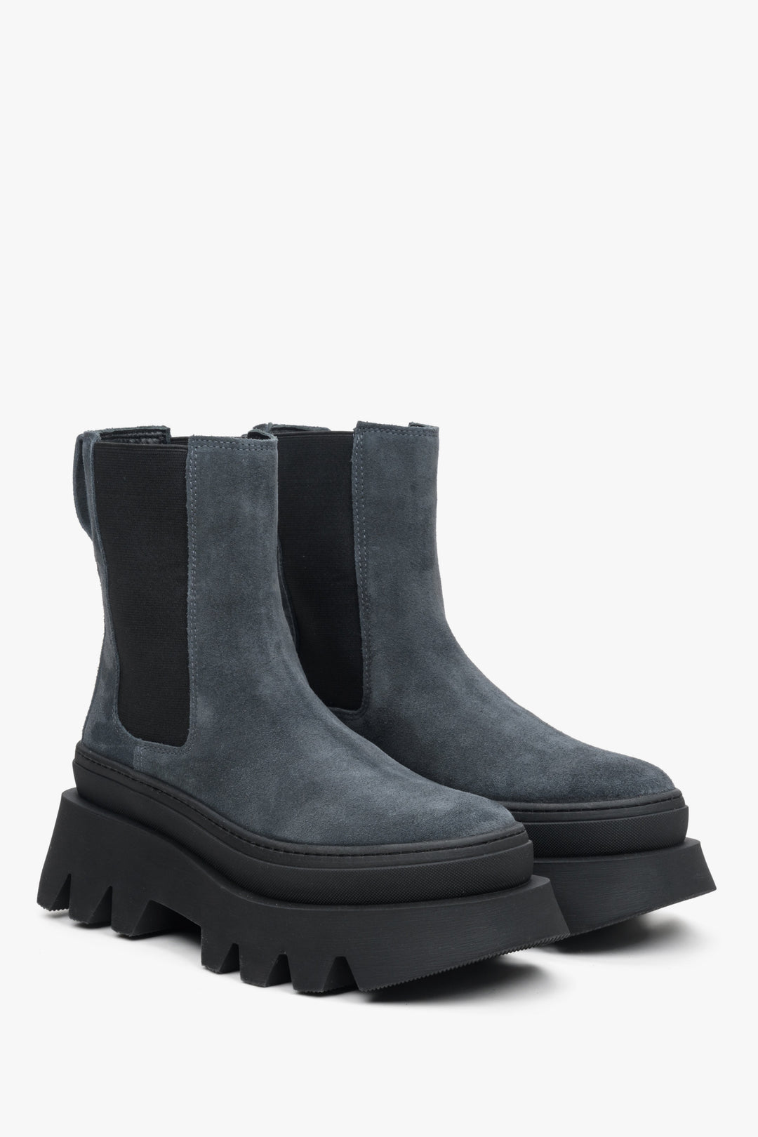Women's grey leather chelsea boots on a platform by Estro - close-up on the toe and side seam of the shoes.