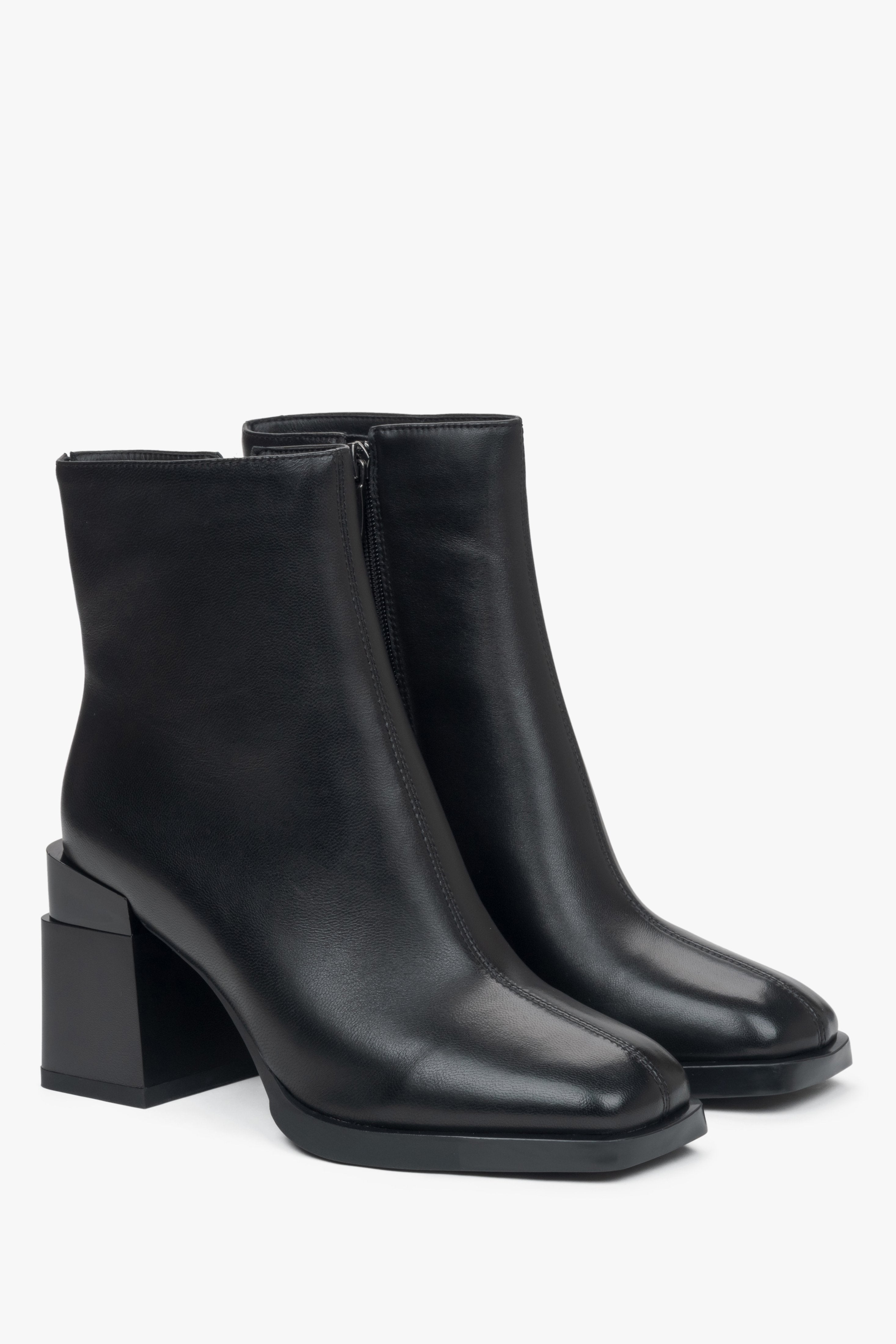 Women's black ankle boots made of genuine leather with a block heel and light insulation.