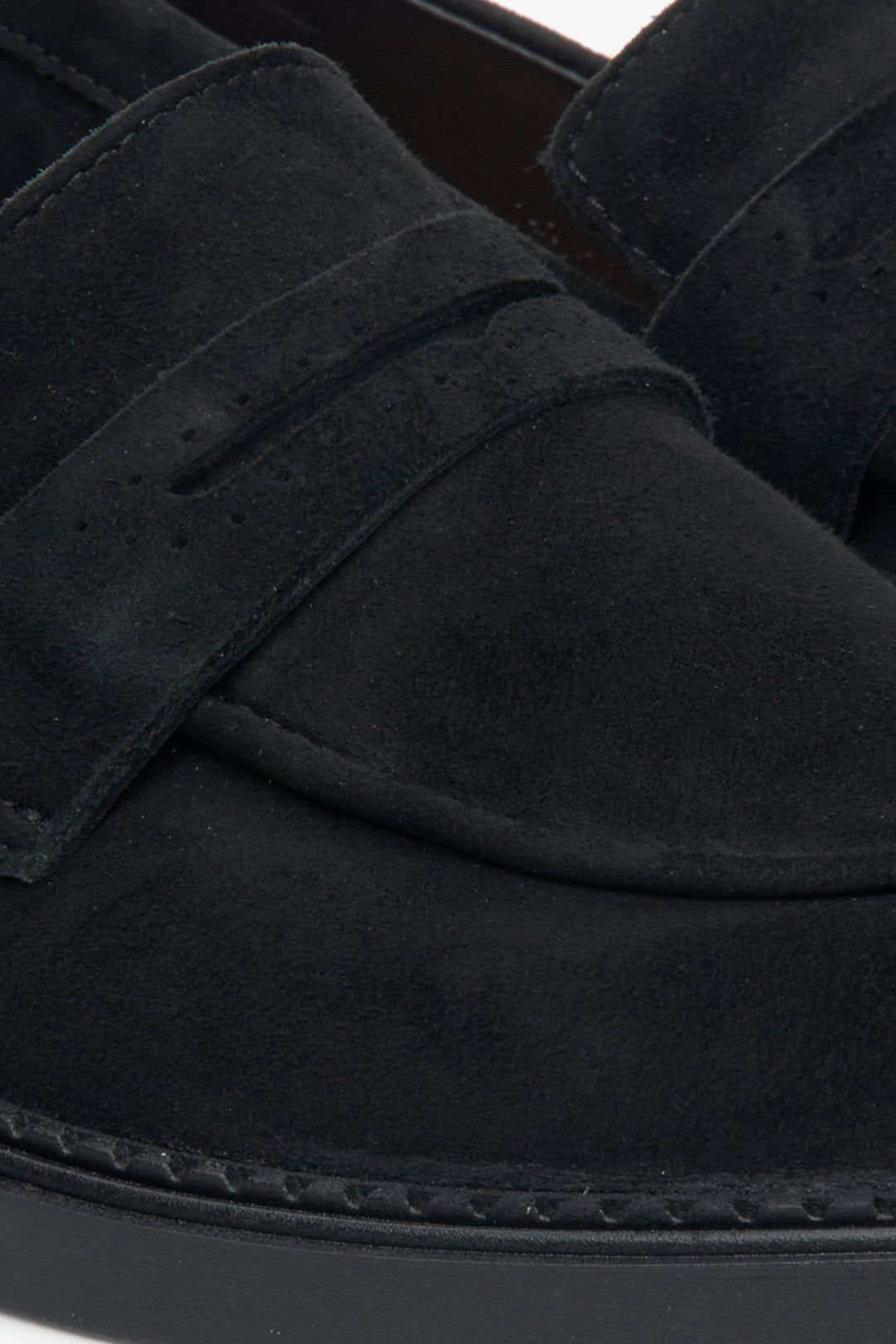Black women's loafers by Estro - a close-up on the sewing line.