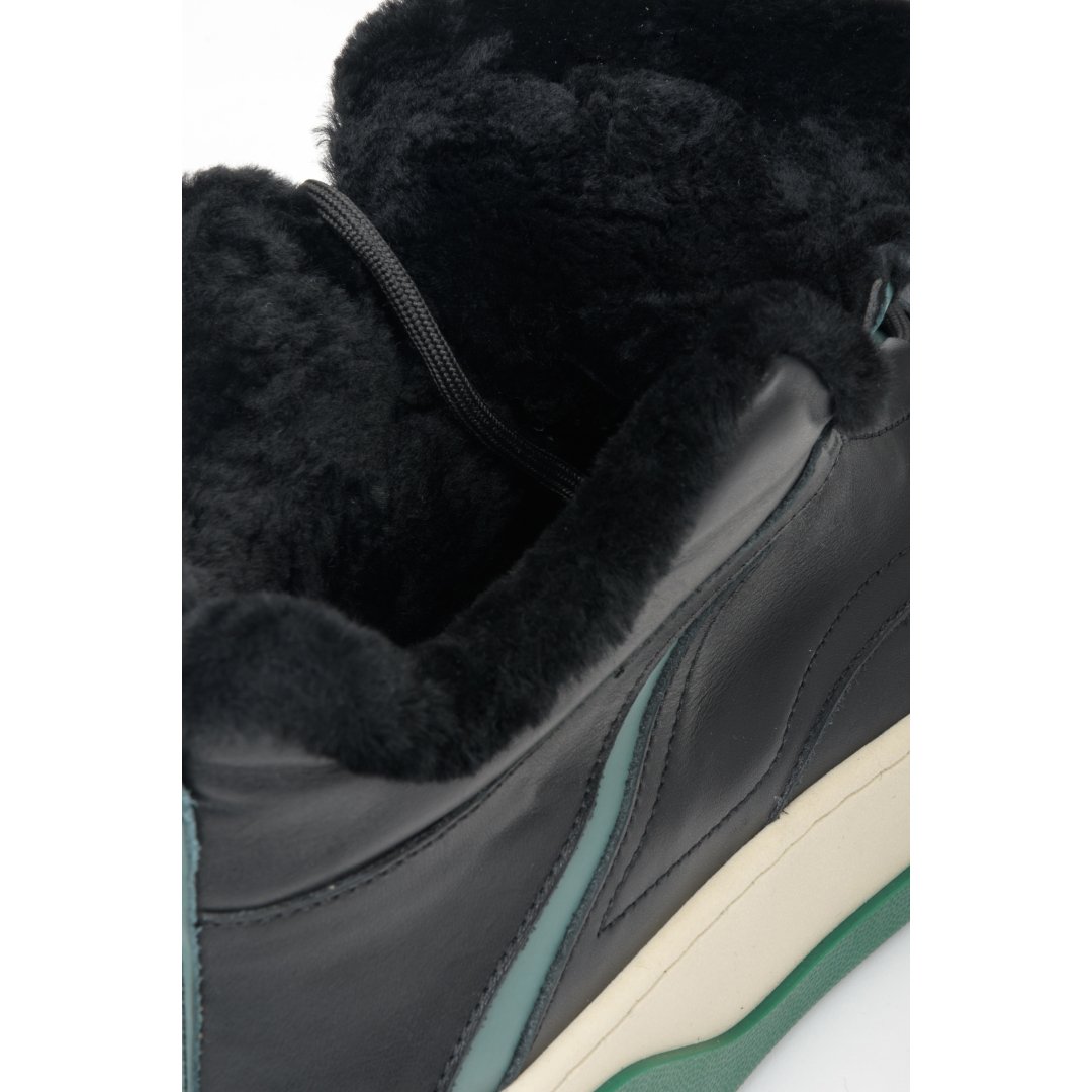 High-top women's sneakers - close-up of the lining made of natural fur.