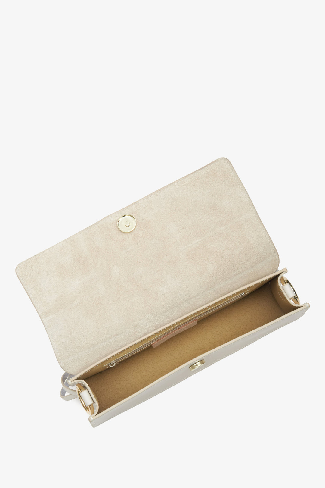 Women's cream beige leather handbag - a close-up on the main compartment.