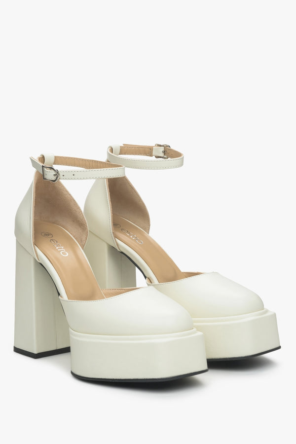 Women's light beige leather platform sandals.