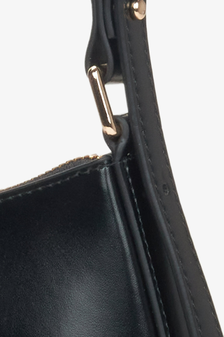 Women's black baguette bag -  a close-up on details.