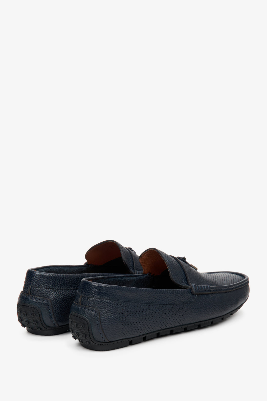 Navy blue leather men's loafers by Estro for fall - close-up on the heel and side seam of the shoes.