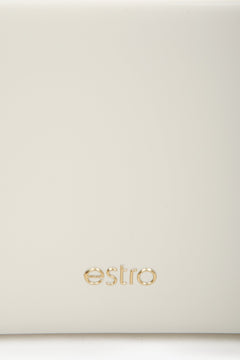 Women's light beige leather handbag - a close-up on details.