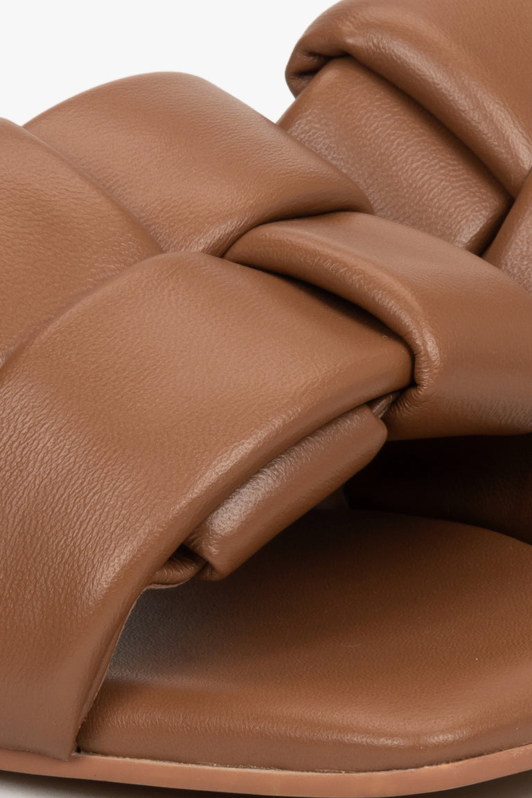 Women's brown slides made of genuine leather by Estro - close-up on detail.