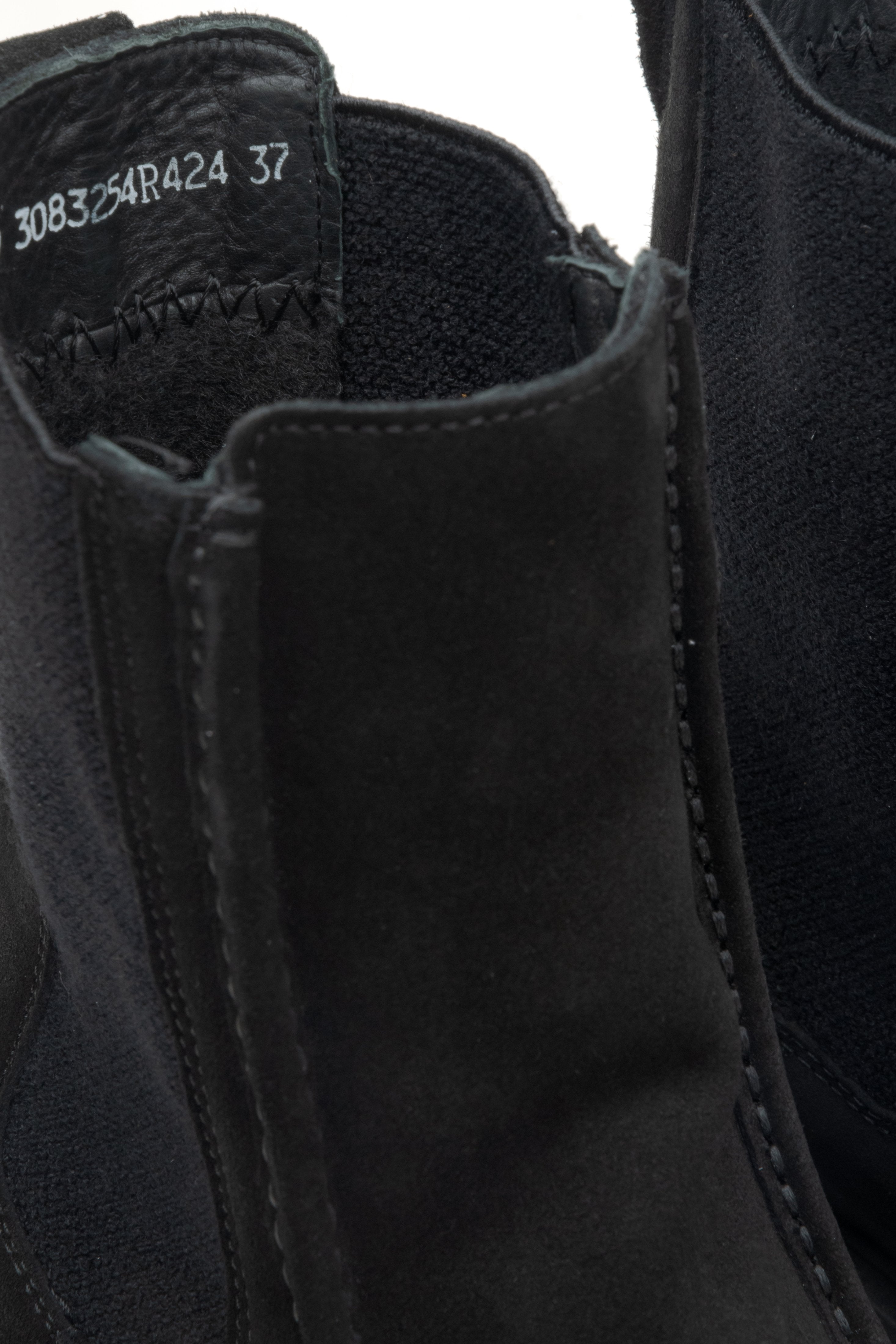 Women's black velour chelsea boots by Estro - close-up of the details.