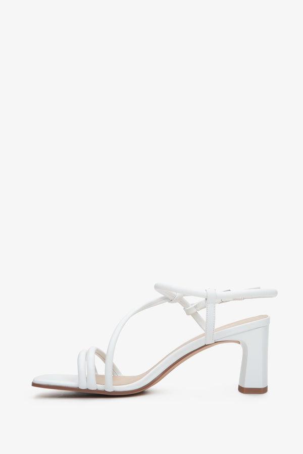 Women's white leather sandals, boasting a stable heel for both style and stability.