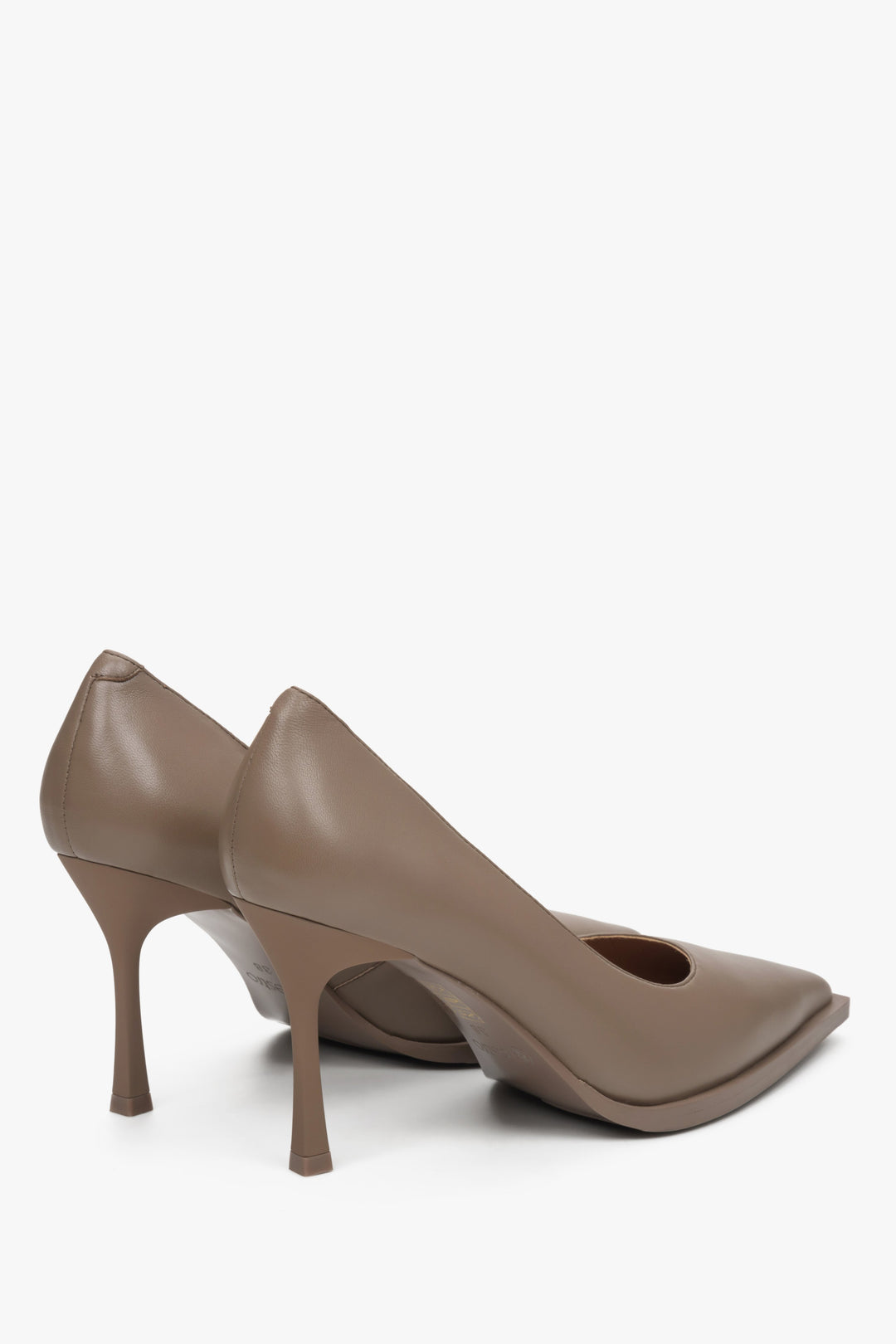 Women's brown leather pumps by Estro.