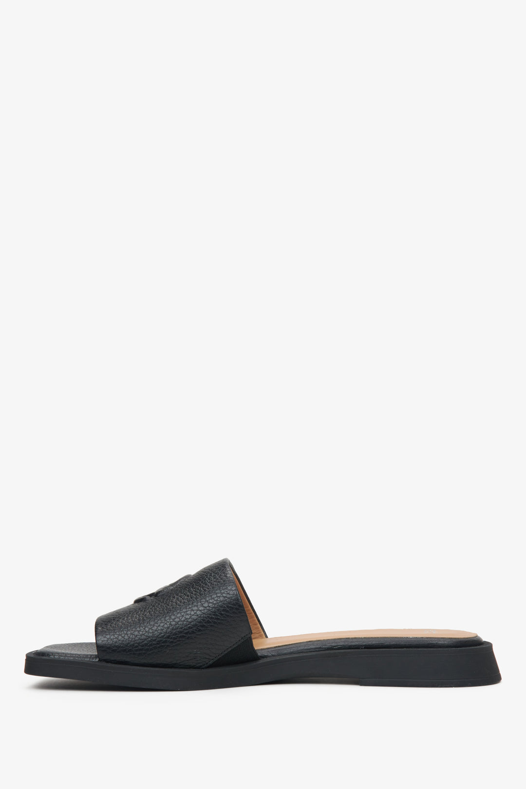 Women's black leather flat sandals by Estro - shoe profile.