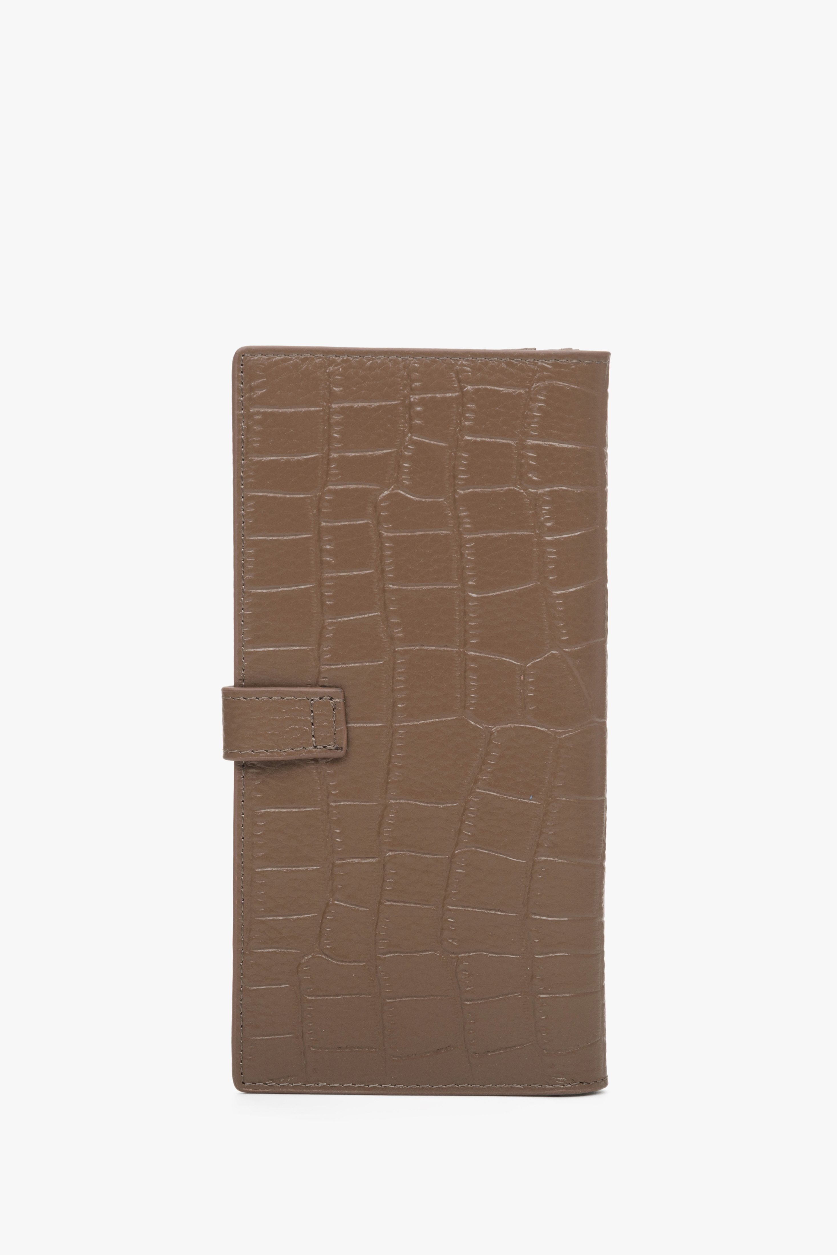 The back of a large brown women's wallet made of embossed genuine leather with gold details by Estro.