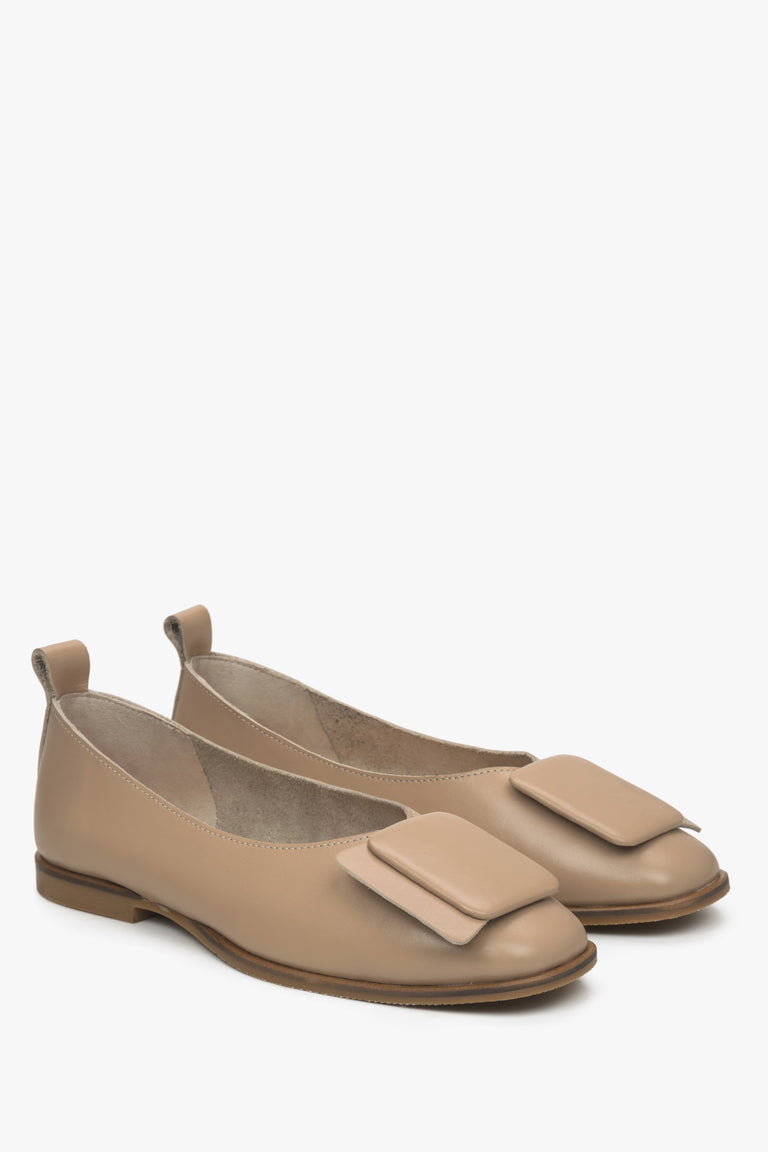 Women's beige leather ballet flats by Estro.