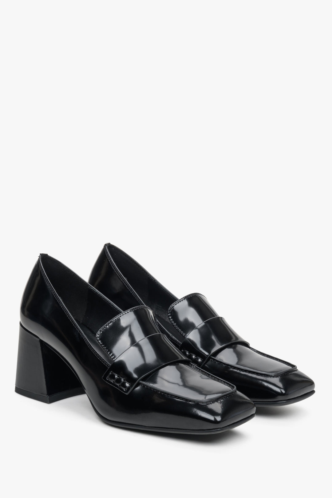 Women's black patent leather  pumps with a heel by Estro.