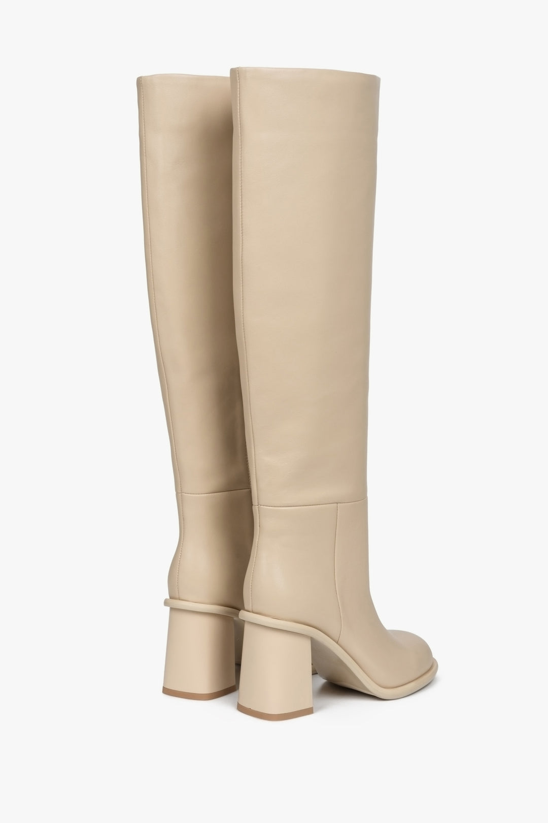 Women's leather boots for spring and autumn by Estro - close-up of the back of the shoe in beige color.