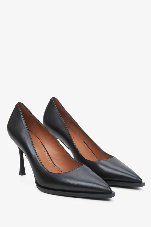 Women's black leather pumps by Estro.