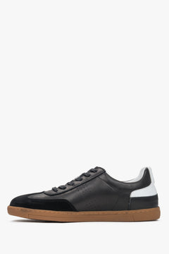 Black men's sneakers made of leather and velour.