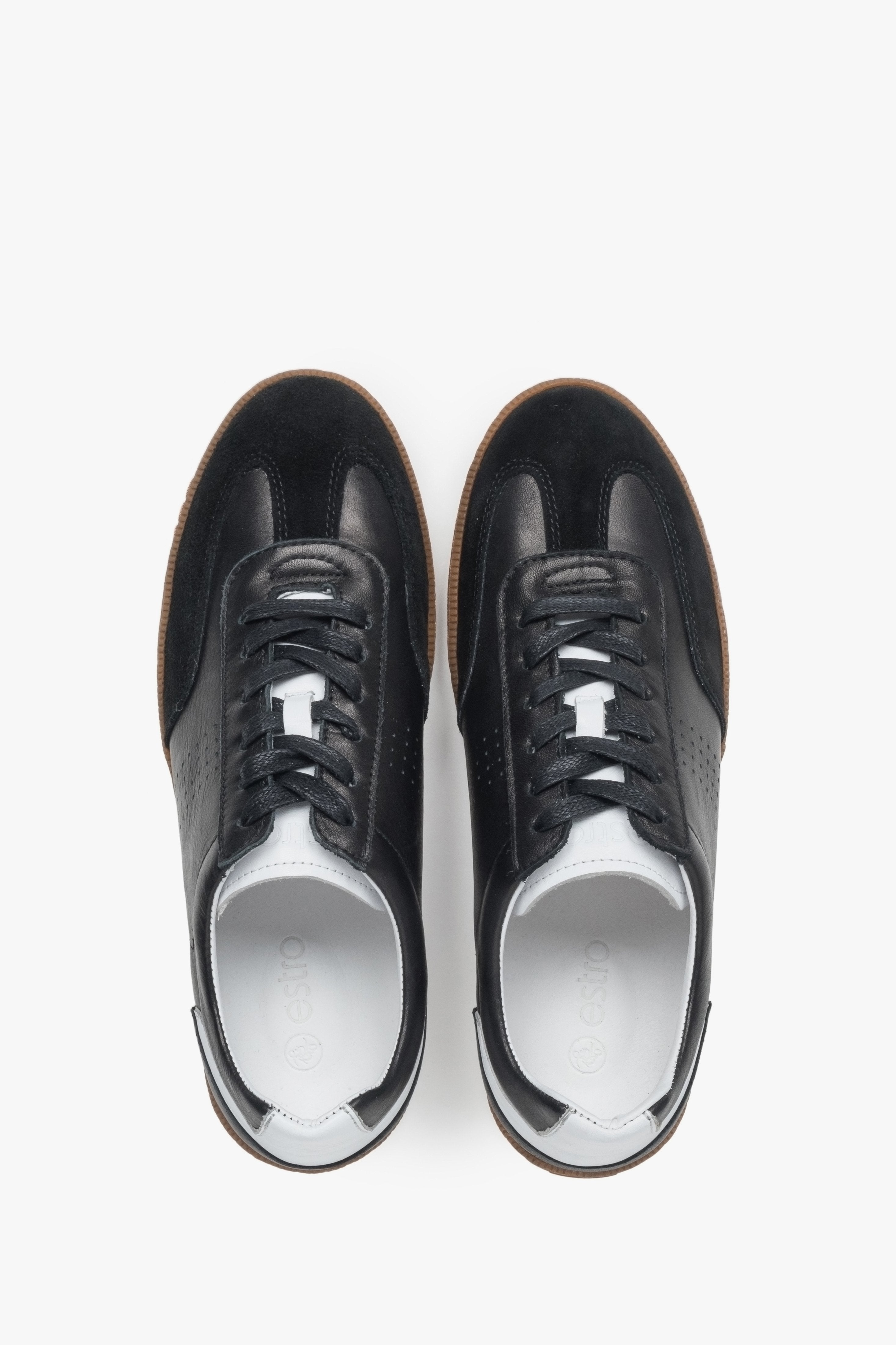 Stylish black men's sneakers made from a combination of genuine leather and velour.