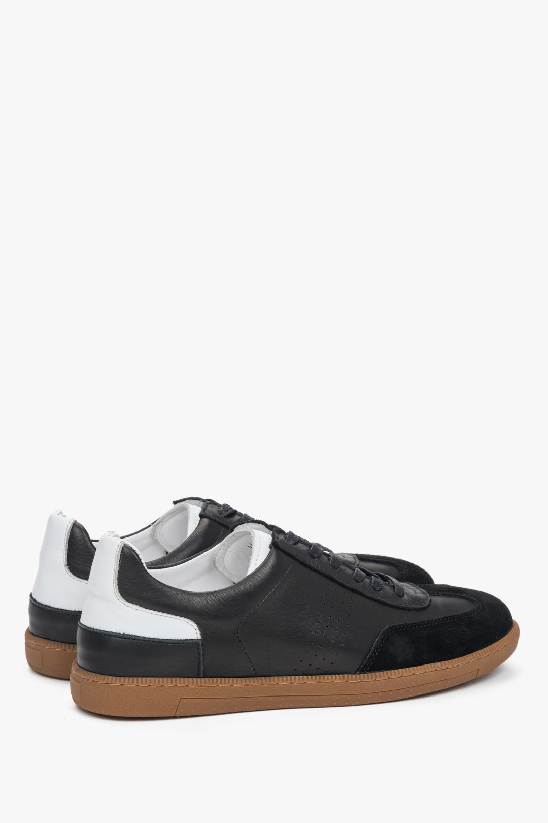 Men’s Estro sneakers in black, made from leather and velour.