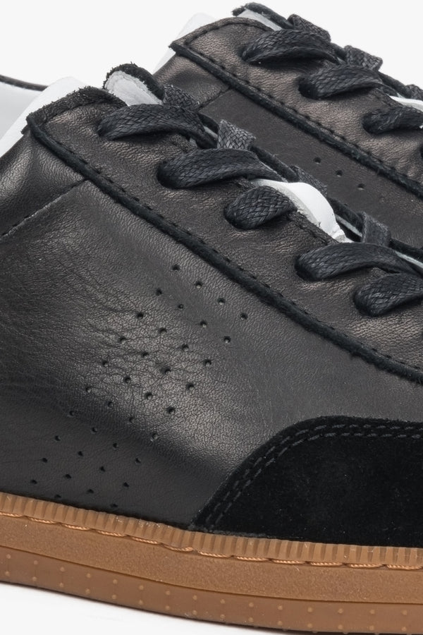 Black men’s sneakers made of genuine leather and velour.