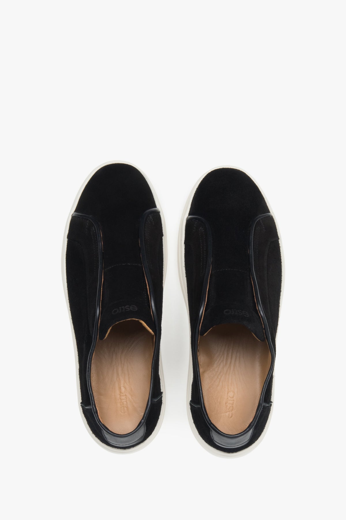 Black sneakers made of natural velour by Estro, ensuring comfort and dynamic movement with a springy sole.