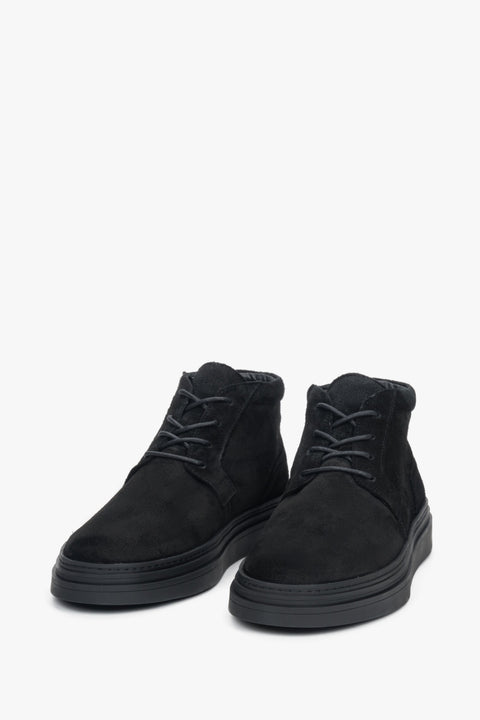 Stylish men's ankle boots in black premium velour featuring light insulation and a flannel lining for warmth.