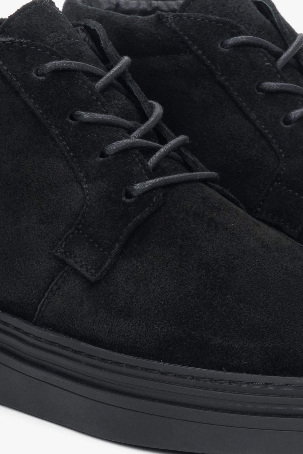 Comfortable and elegant men's black boots made of genuine velour with short lacing and a flexible thermoplastic rubber sole.
