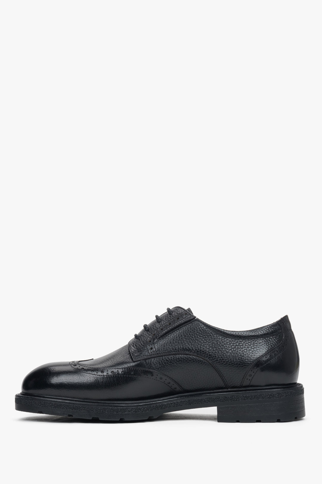 Side view highlighting decorative perforations and classic lace-up closure.