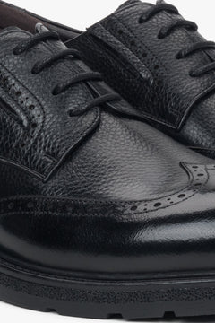 Durable rubber sole and flat heel ensuring stability and all-day comfort.