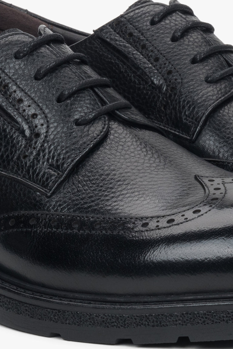 Durable rubber sole and flat heel ensuring stability and all-day comfort.