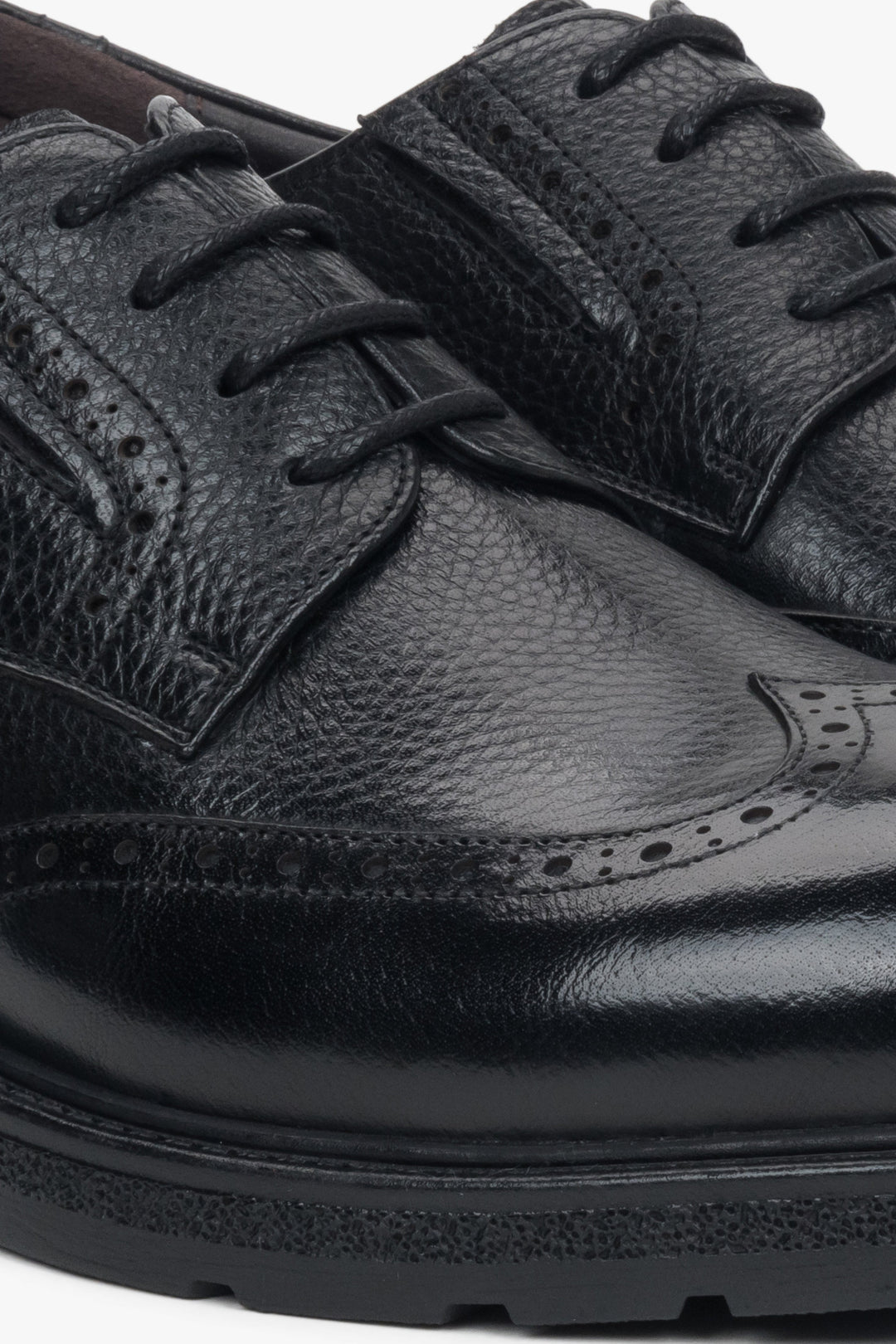 Durable rubber sole and flat heel ensuring stability and all-day comfort.
