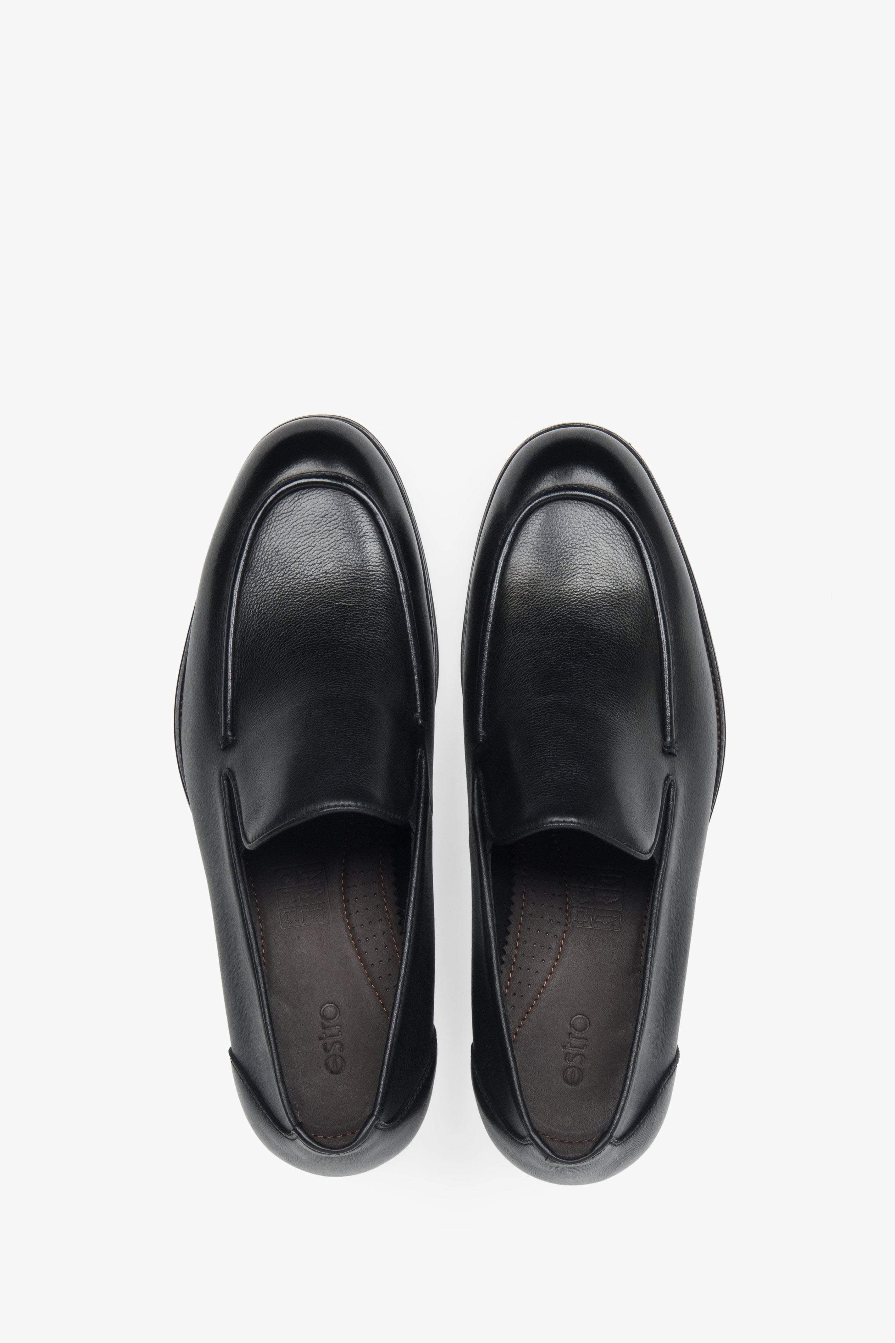 A modern classic from Estro — black leather loafers combining effortless elegance with durable craftsmanship.