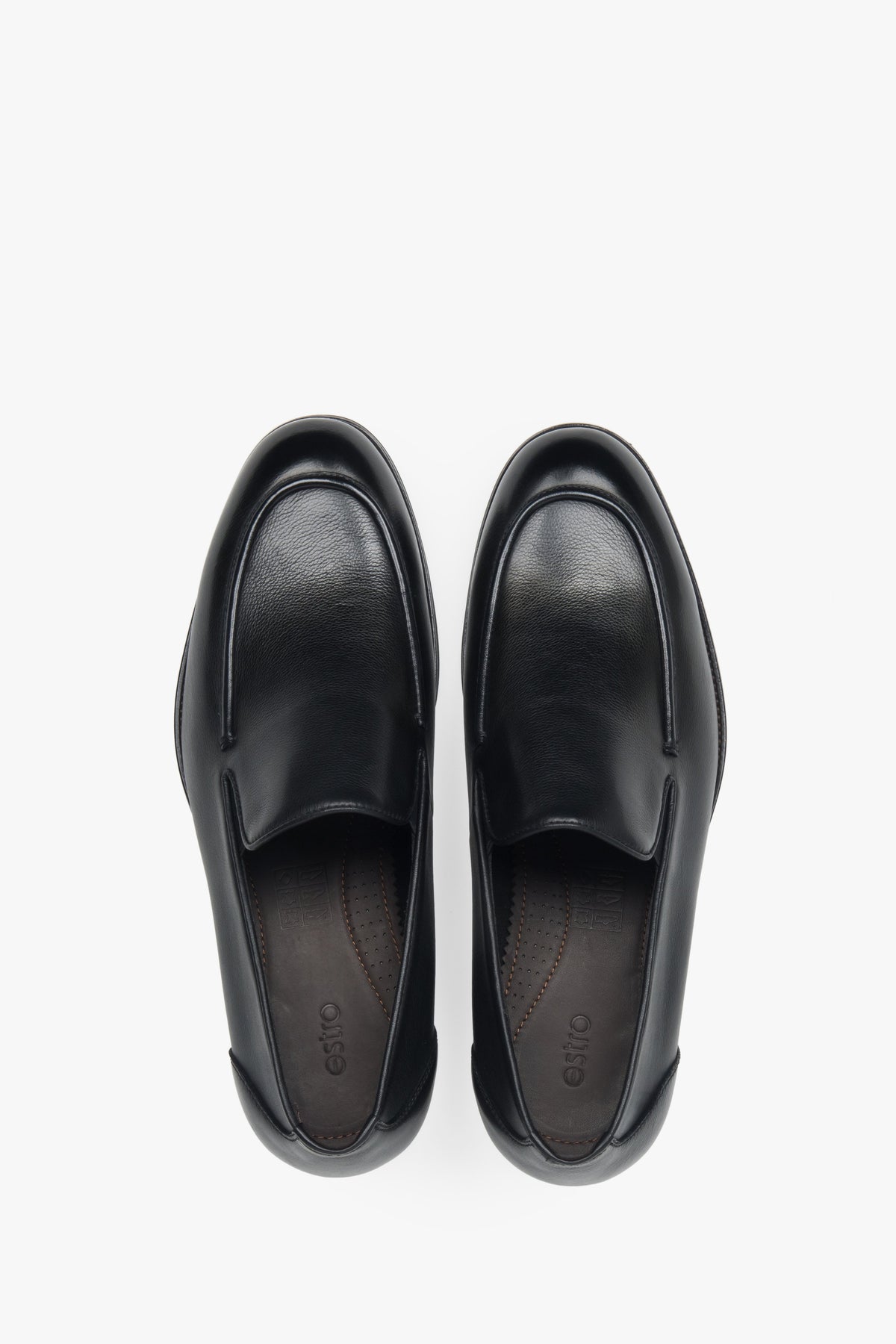 A modern classic from Estro — black leather loafers combining effortless elegance with durable craftsmanship.