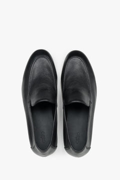 Formal men's loafers featuring a premium leather interior and rubber sole.