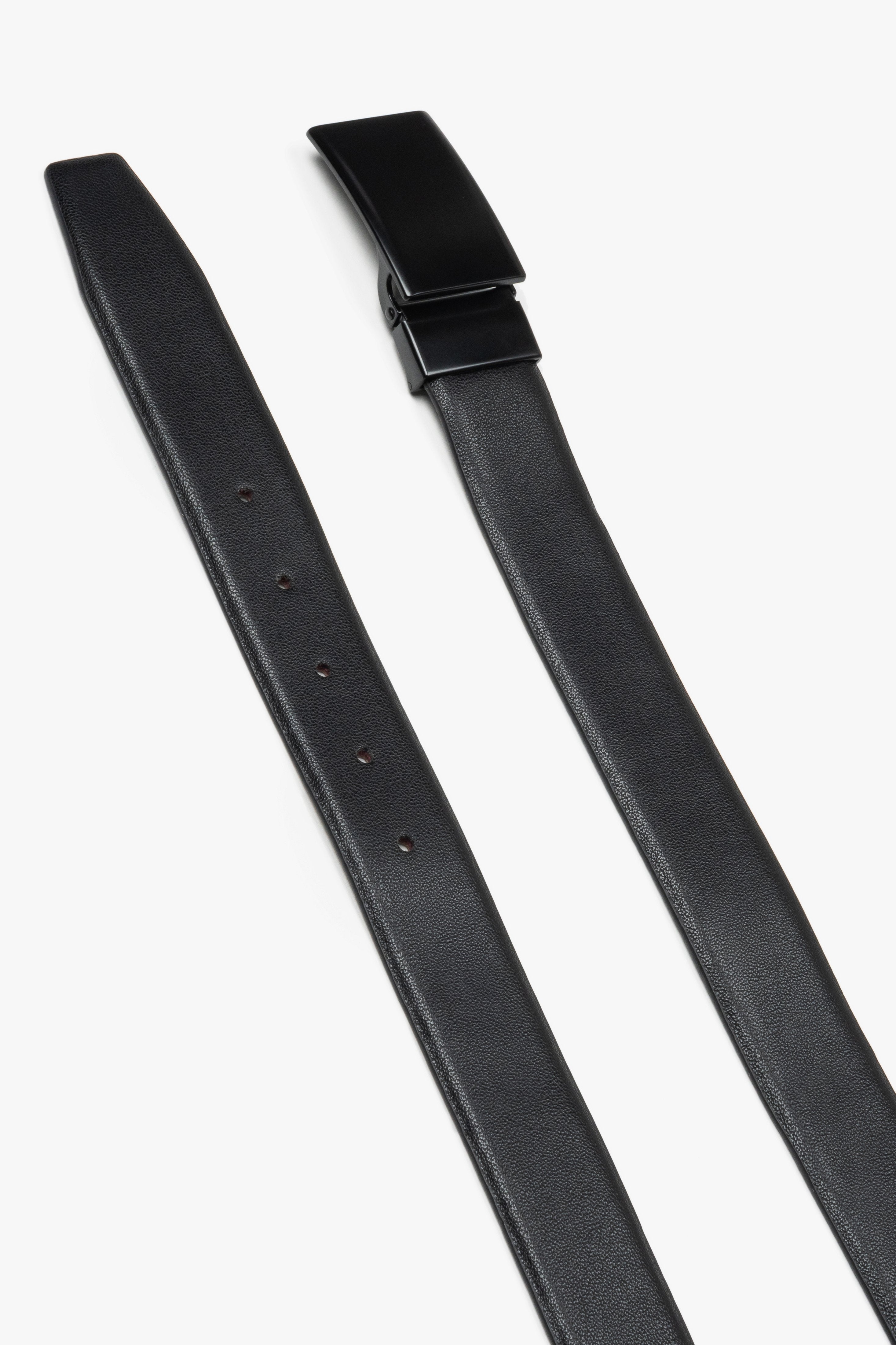 Elegant men's belt made of black genuine leather with a simple buckle.