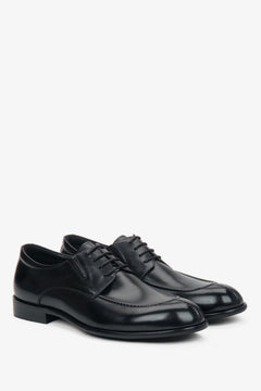 Men's black genuine leather derby shoes with a classic lace-up design and a sleek silhouette — a timeless essential for every wardrobe.