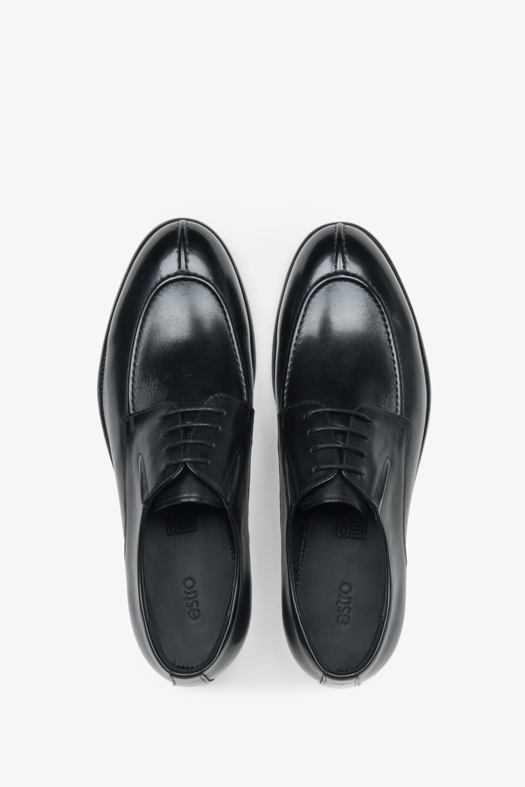 A modern take on a classic — men's black leather derby shoes with short laces and a flat heel, perfect for both formal and casual looks.