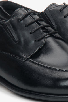 Stylish and comfortable men's black derby shoes from Estro, featuring a minimalist design and smooth leather finish for everyday elegance.