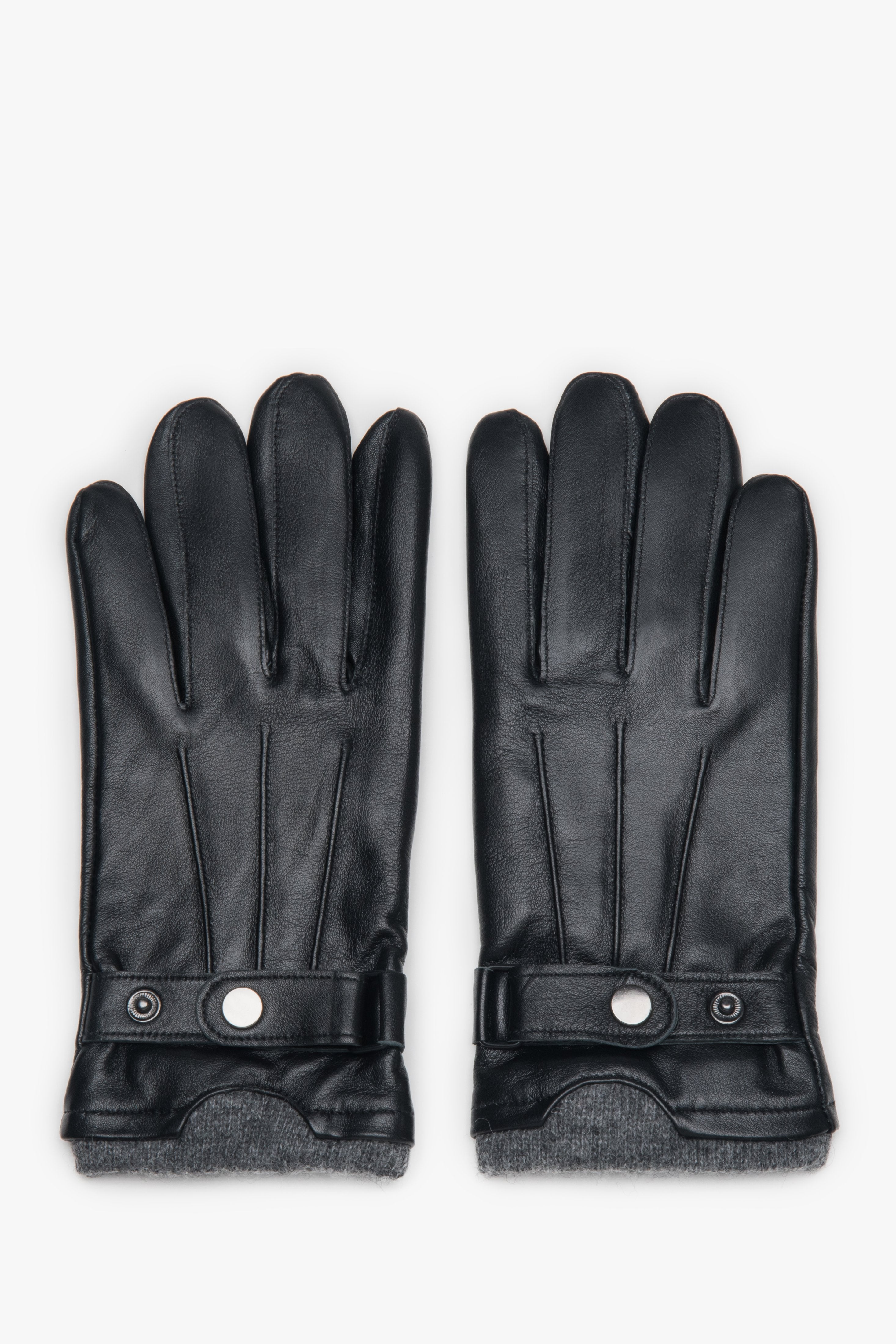 Black men’s gloves by Estro, made of genuine leather, with a decorative pin.