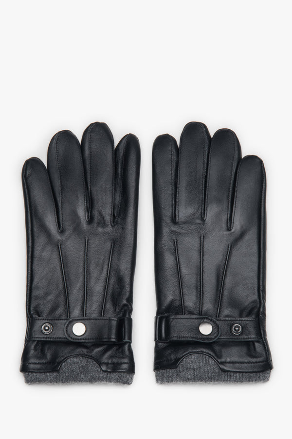 Black men’s gloves by Estro, made of genuine leather, with a decorative pin.