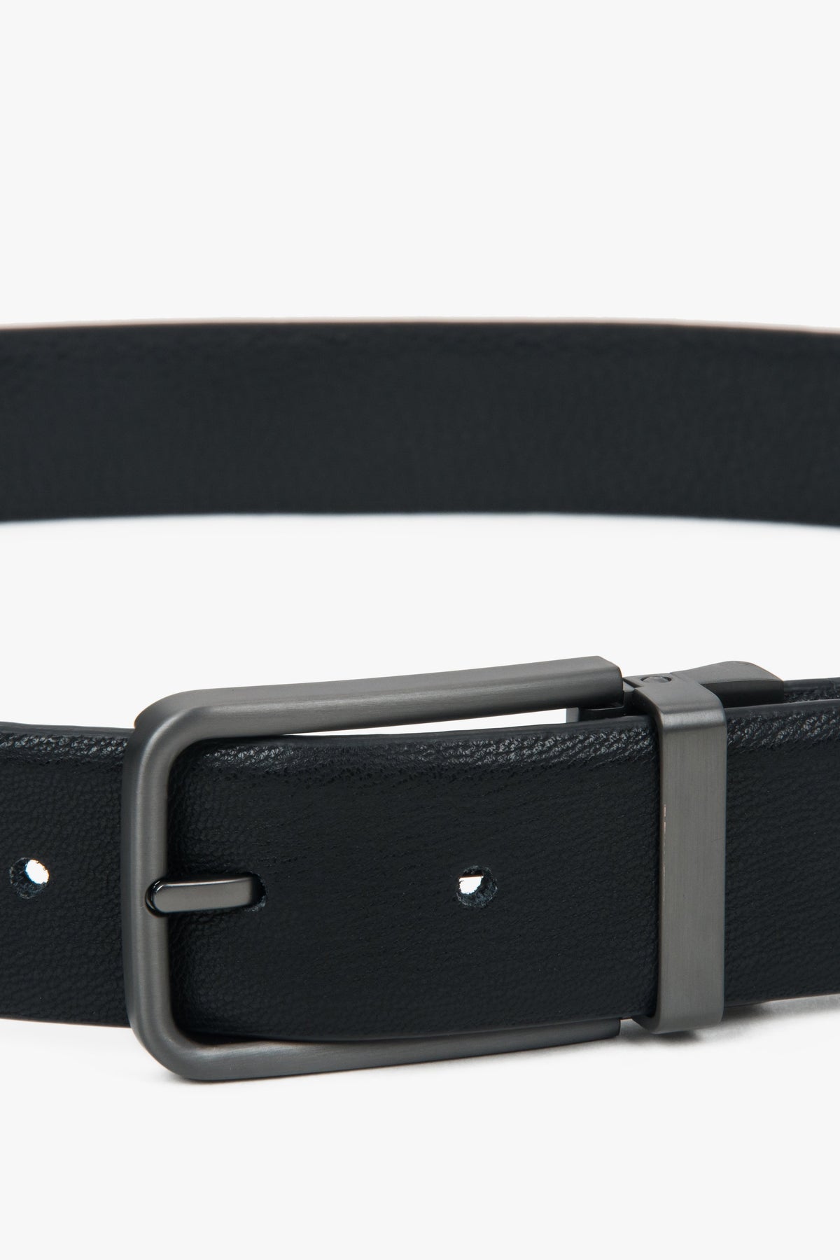 Crafted from 100% natural leather, this men's black belt with a polished silver chrome buckle adds sophistication to any outfit.