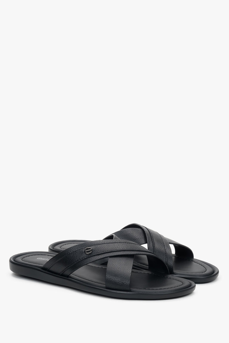 Summer leather slide sandals with wide crossed straps for a secure fit.