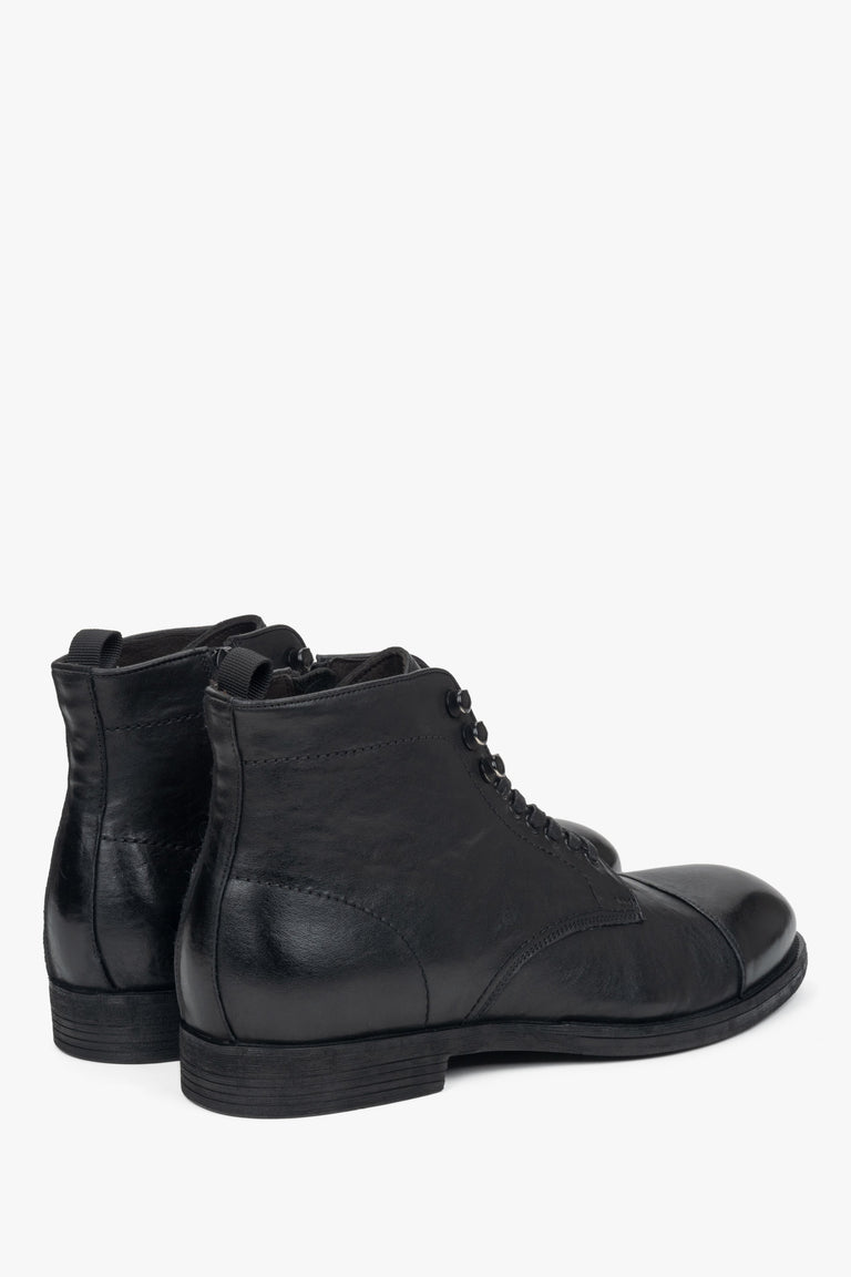 Step up your style with Estro’s black leather laced-up ankle boots for men - shoe heel line.